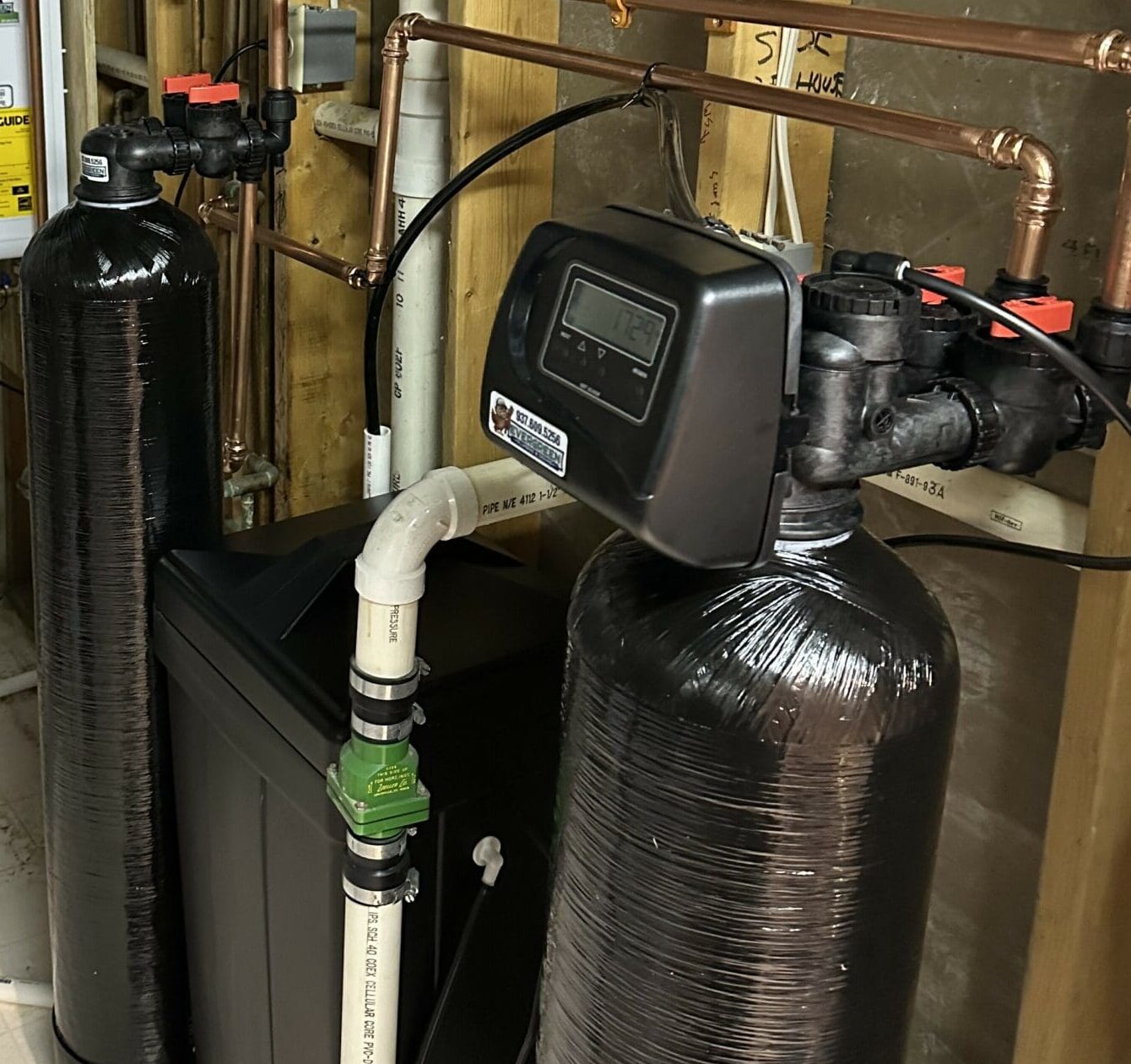 Whole house water conditioner and filtration system installed in a basement